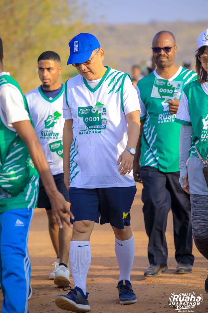 Participants running through scenic landscapes during GRUMA